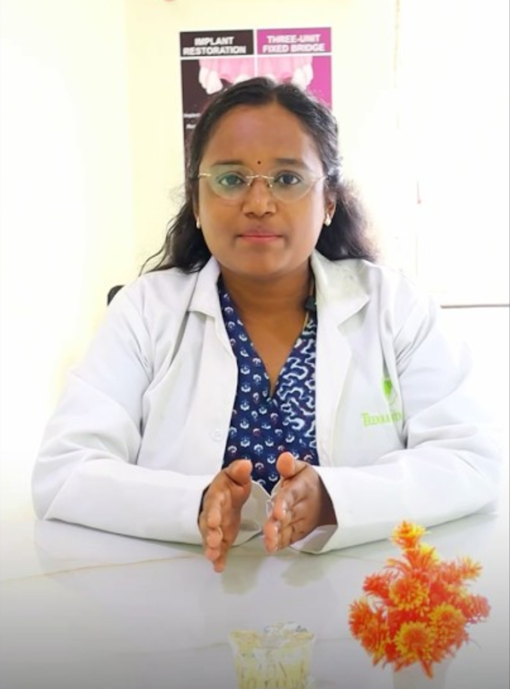 Dr. Paarvathi treating a patient